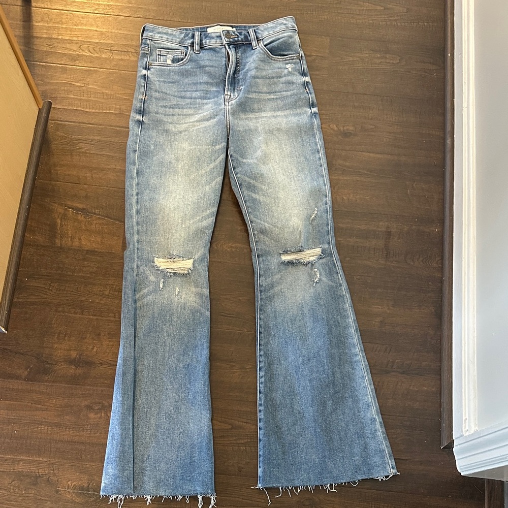 Women's Washed Blue Flare Jeans with Knee Distressing